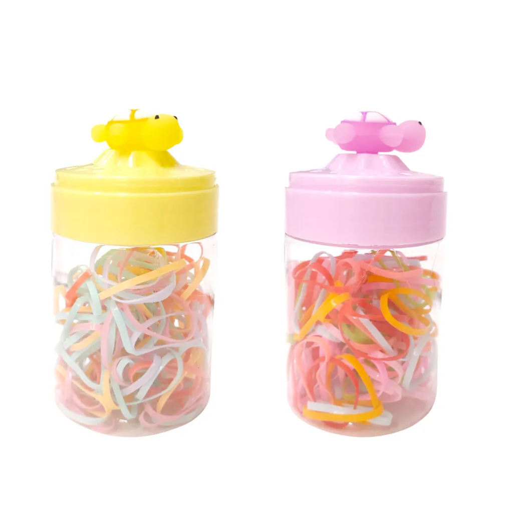 Colitas para el cabello de goma en frasco